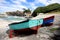 Two colourfull fishing boats docked