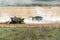 Two combines collects the stubble remains on the cutover field during harvesting