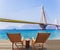 Two comfortable wooden loungers on the beach