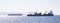 Two container ships for international transport sail full of cargo. Sea commerce, sky background, banner.