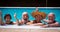 Two couples of senior people friends laughing enjoying the swimmin pool together. Bright sunlight and transparent water. Large