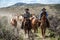 Two cowboys lead the horse herd on annual trail drive May 1, 2016 Craig, COrive roundup