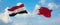 two crossed flags Bahrain and Egypt waving in wind at cloudy sky. Concept of relationship, dialog, travelling between two