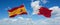two crossed flags Bahrain and spain waving in wind at cloudy sky. Concept of relationship, dialog, travelling between two