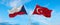 two crossed flags Czech Republic and Turkey waving in wind at cloudy sky. Concept of relationship, dialog, travelling between two