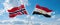 two crossed flags Egypt and Norway waving in wind at cloudy sky. Concept of relationship, dialog, travelling between two countries