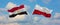 two crossed flags Egypt and Poland waving in wind at cloudy sky. Concept of relationship, dialog, travelling between two