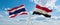 two crossed flags Egypt and Thailand waving in wind at cloudy sky. Concept of relationship, dialog, travelling between two