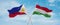 two crossed flags Hungary and Philippines waving in wind at cloudy sky. Concept of relationship, dialog, travelling between two