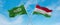 two crossed flags Hungary and Saudi Arabia waving in wind at cloudy sky. Concept of relationship, dialog, travelling between two