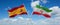 two crossed flags Iran and spain waving in wind at cloudy sky. Concept of relationship, dialog, travelling between two countries