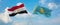 two crossed flags Kazakhstan and Egypt waving in wind at cloudy sky. Concept of relationship, dialog, travelling between two