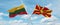 two crossed flags Macedonia and Lithuania waving in wind at cloudy sky. Concept of relationship, dialog, travelling between two