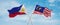 two crossed flags Malaysia and Philippines waving in wind at cloudy sky. Concept of relationship, dialog, travelling between two