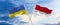 two crossed flags Monaco and Ukraine waving in wind at cloudy sky. Concept of relationship, dialog, travelling between two
