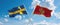 two crossed flags Montenegro and Sweden waving in wind at cloudy sky. Concept of relationship, dialog, travelling between two