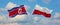 two crossed flags North Korea and Poland waving in wind at cloudy sky. Concept of relationship, dialog, travelling between two