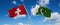 two crossed flags Pakistan and Switzerland waving in wind at cloudy sky. Concept of relationship, dialog, travelling between two