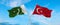 two crossed flags Pakistan and Turkey waving in wind at cloudy sky. Concept of relationship, dialog, travelling between two