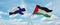 two crossed flags Palestine and finland waving in wind at cloudy sky. Concept of relationship, dialog, travelling between two