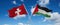 two crossed flags Palestine and Switzerland waving in wind at cloudy sky. Concept of relationship, dialog, travelling between two