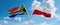 two crossed flags poland and South Africa waving in wind at cloudy sky. Concept of relationship, dialog, travelling between two