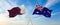 two crossed flags Qatar and Australia waving in wind at cloudy sky. Concept of relationship, dialog, travelling between two