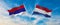 two crossed flags Republic Srpska and Netherland waving in wind at cloudy sky. Concept of relationship, dialog, travelling