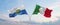 two crossed flags San Marino and Italy waving in wind at cloudy sky. Concept of relationship, dialog, travelling between two