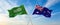 two crossed flags Saudi Arabia and Australia waving in wind at cloudy sky. Concept of relationship, dialog, travelling between two