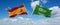 two crossed flags Saudi Arabia and spain waving in wind at cloudy sky. Concept of relationship, dialog, travelling between two