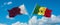 two crossed flags Senegal and Qatar waving in wind at cloudy sky. Concept of relationship, dialog, travelling between two