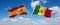 two crossed flags Senegal and spain waving in wind at cloudy sky. Concept of relationship, dialog, travelling between two