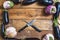 Two crossed knives in frame of eggplant lie on boards