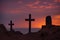 Two Crosses Silhouetted Against Evening Sky
