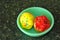 Two cup cakes in a bowl