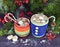 Two cups with Christmas drink and marshmallow