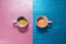 Two cups coffee bright pink blue brilliant paper