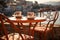 Two cups of coffee on a table of outdoor restaurant in small seaside town in Italy. Having breakfast coffee in Italian scenery on