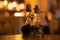 Two curly glass bottles with wooden corks with balsamic vinegar, oil on the table in a italian restaurant