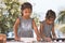 Two cute asian little child girls prepare a dough for baking