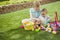Two Cute little boys collecting eggs on an Easter Egg hunt outdoors
