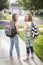 Two cute school girls heading off to school