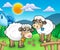 Two cute sheep behind fence