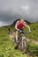 Two Cyclists On Countryside Track