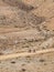 Two cyclists go for an off-road ride on a mountain path in Oman