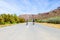 Two cyclists riding on a tar road in the Karoo