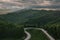 two cyclists on road bikes drive alone in untoch forest