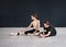 Two dancers friends practice in dance studio