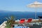 Two deckchairs on the roof. Santorini island, Greece